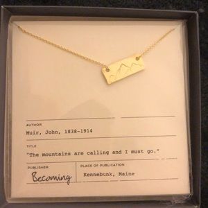 Gold necklace with traced mountain pendant